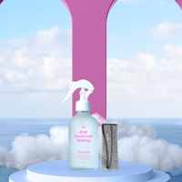 one yoga mat cleaner in bottle and microfiber towel