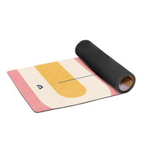 rolled yoga mat with pink and yellow design