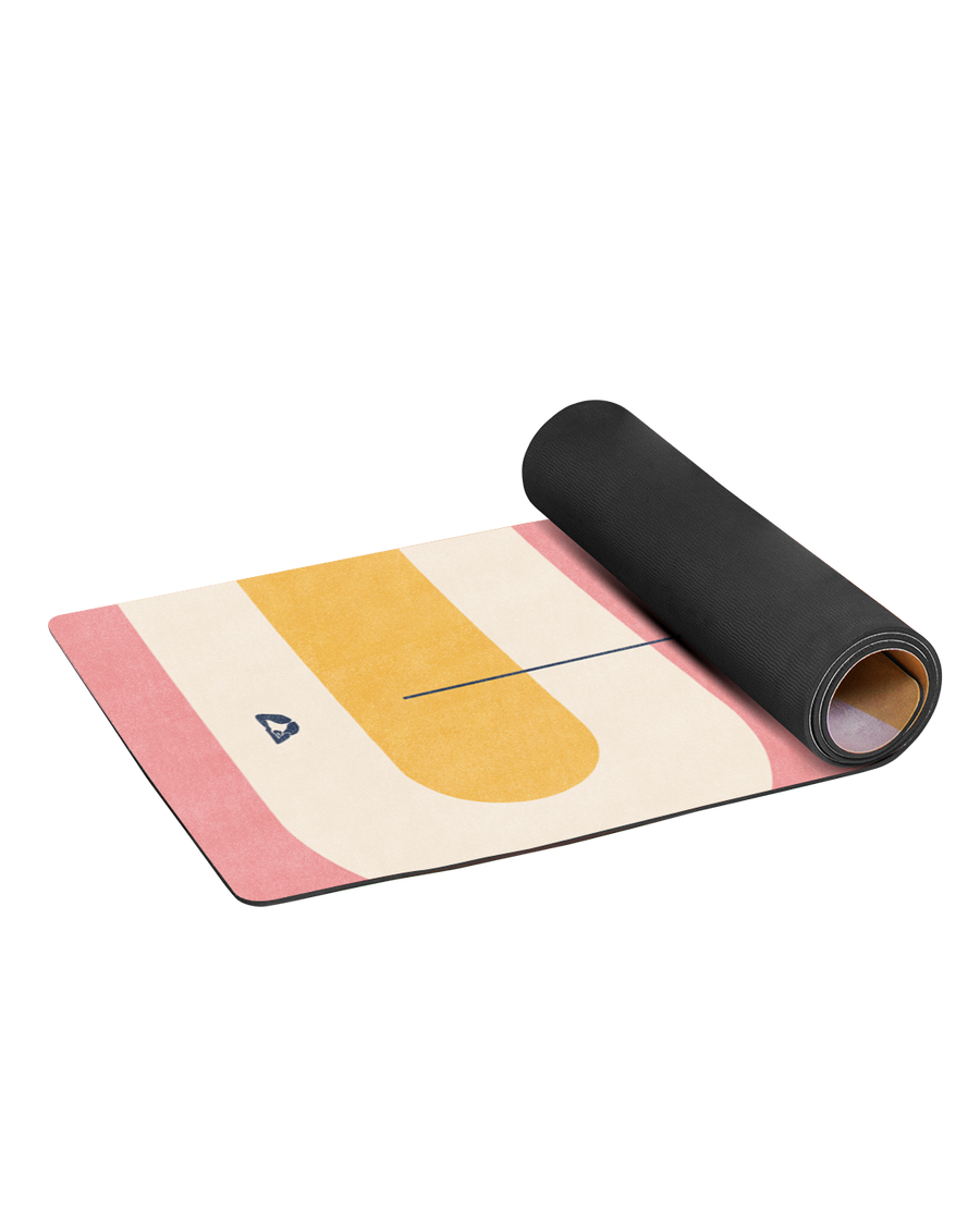 rolled yoga mat with pink and yellow design