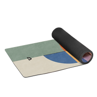 rolled yoga mat with multicolor abstract design