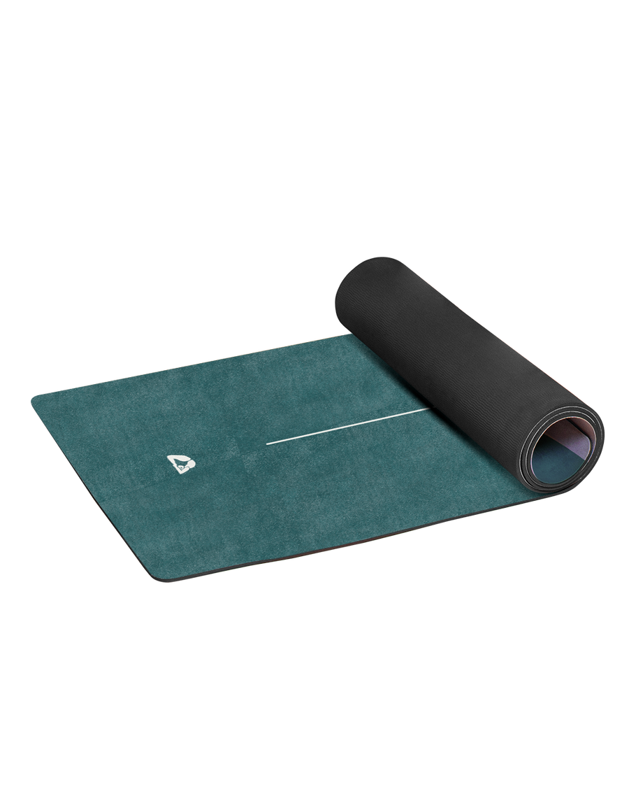 rolled yoga mat with green design 
